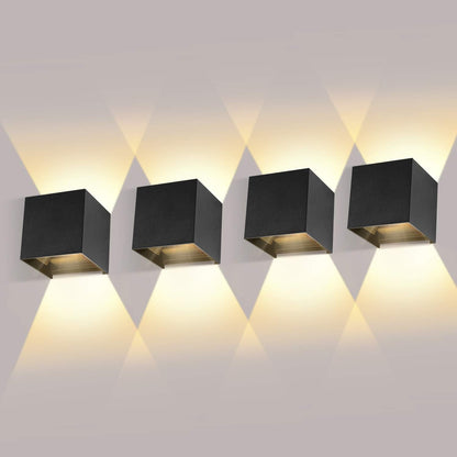 ledmo 4er LED Wandleuchten Innen/Aussen 12W warmweiss schwarz. Schwarze, kompakte Leuchten spenden warmweißes Licht für Innen- und Aussenbeleuchtung.