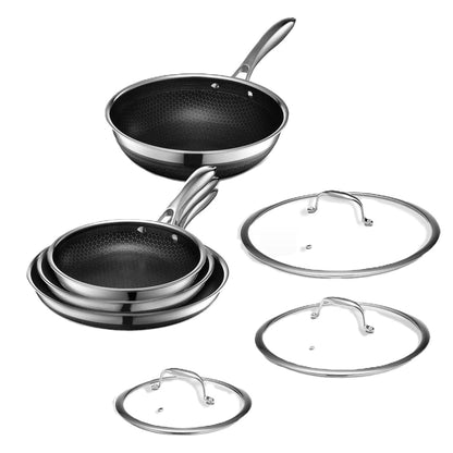 HexClad Hybrid-Edelstahl Kochgeschirr Set - 7-teilig. Rundes, silberfarbenes Set zum Braten und Kochen von Speisen.