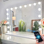 FENCHILIN Bluetooth Schminkspiegel Hollywood Kosmetikspiegel – 80x58. Rechteckig, mit dimmbarer LED-Beleuchtung und Bluetooth-Lautsprechern.