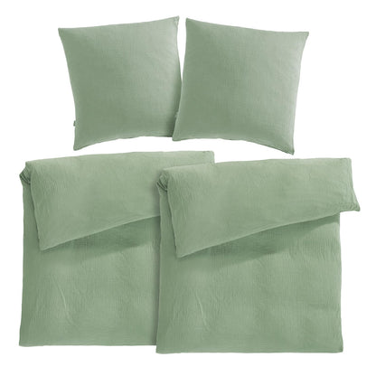 Pure Label Musselin Bettwäsche Set 4-teilig - 135x200 Grün. Grüner Musselin-Bettbezug und Kopfkissenbezüge für Einzelbetten, für erholsamen Schlaf.