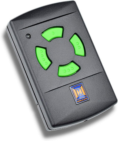 Hörmann Handsender HSM4 Funk-Fernbedienung – 26,975 MHz. Schwarzes, rechteckiges Gerät steuert Hörmann Torantriebe per Funk.