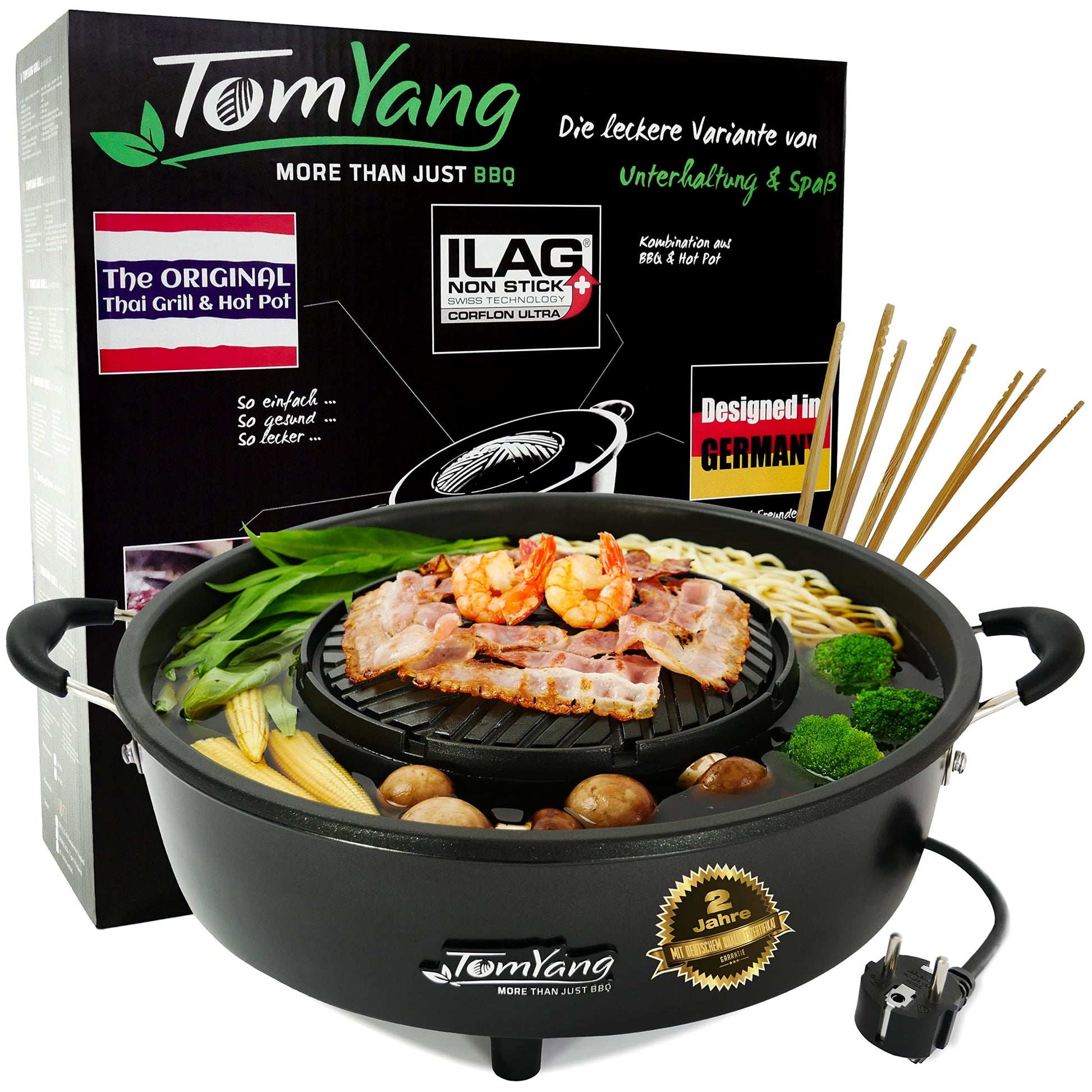 TomYang Hot Pot Thai Grill Mookata Topf - Original. Runder, schwarzer Topf mit Grillplatte und Suppenring zum Grillen und gleichzeitigen Kochen.