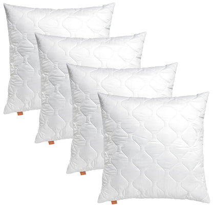 sleepling Komfort 100 Kopfkissen 80x80 cm 4er Set. Vier quadratische, weiße Kopfkissen bieten ergonomische Kopfstütze im Schlaf.