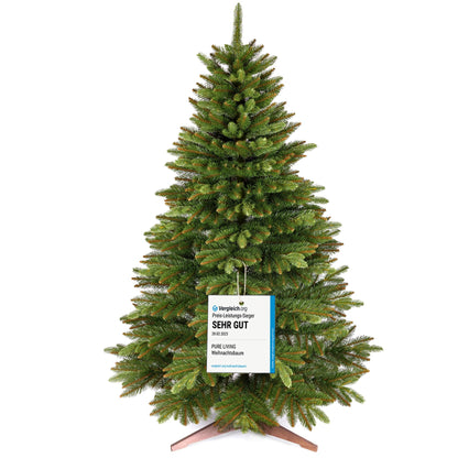Pure Living Premium Testsieger Weihnachtsbaum künstlich 220cm. Konisch, grüne Nadeln. Dient als festliche Weihnachtsdekoration.