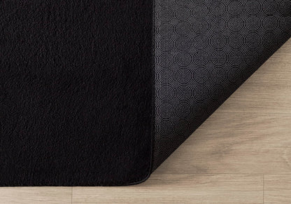 the carpet Relax Kurzflor-Teppich in Felloptik, Schwarz, 160 x 220 cm